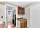 Laundry room and utility sink with access to the backyard with a pair of modern black washing machines at 113 Hartley Hall Ct, Summerville, SC 29485