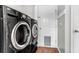 Convenient laundry room equipped with modern washer and dryer units at 113 Hartley Hall Ct, Summerville, SC 29485