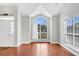 Bright living room featuring vaulted ceiling and many large windows providing natural light at 113 Hartley Hall Ct, Summerville, SC 29485