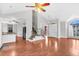 An open-concept living room with hardwood floors and natural light at 113 Hartley Hall Ct, Summerville, SC 29485