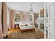 Charming bedroom with hardwood floors, fireplace and ample natural light at 12 Percy St, Charleston, SC 29403