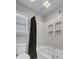 Bright bathroom featuring a tub, shower, and window at 1205 Scotch Pine Ln, Ladson, SC 29456