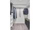 Bright walk-in closet featuring built-in shelving and ample storage space for clothes and accessories at 1205 Scotch Pine Ln, Ladson, SC 29456