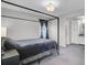 Stylish bedroom with a canopy bed, patterned curtains, and bedside tables at 1205 Scotch Pine Ln, Ladson, SC 29456