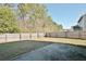 Fenced backyard featuring a concrete patio and a grass lawn, perfect for outdoor activities at 122 Rockingham Way, Moncks Corner, SC 29461