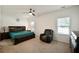 Bedroom with a ceiling fan and neutral carpeting, offering a relaxing and comfortable space at 122 Rockingham Way, Moncks Corner, SC 29461