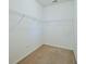Walk-in closet featuring carpet and metal shelving at 122 Rockingham Way, Moncks Corner, SC 29461