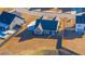 Aerial view of a home featuring a backyard with a pool, fence and well-maintained landscaping at 130 Darby Mdw Ln, Ridgeville, SC 29472