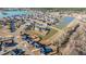 Aerial view of a community featuring a pond, well-maintained homes, and a Gathering-friendly neighborhood setting at 130 Darby Mdw Ln, Ridgeville, SC 29472