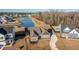 Inviting aerial view of the property showcasing a well-manicured lawn and a long driveway in a Gathering-friendly neighborhood at 130 Darby Mdw Ln, Ridgeville, SC 29472