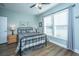 Cozy bedroom offers natural light and a ceiling fan for added comfort at 130 Darby Mdw Ln, Ridgeville, SC 29472