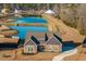 Beautiful one-story home with stone and siding, mature landscaping, and a long driveway at 130 Darby Mdw Ln, Ridgeville, SC 29472