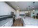 Well-equipped kitchen featuring granite countertops, stainless steel appliances, and a center island at 130 Darby Mdw Ln, Ridgeville, SC 29472