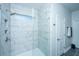 Luxurious tile shower features a shower niche and window for natural lighting at 130 Darby Mdw Ln, Ridgeville, SC 29472