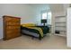 Bedroom with a large chest of drawers providing ample storage space at 130 River Landing Dr # 6207, Charleston, SC 29492