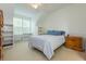 Serene bedroom with comfortable bed, natural light, and ample closet space for storage at 130 River Landing Dr # 6207, Charleston, SC 29492