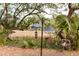 Backyard bird feeders enhance the property's natural setting with mature trees and view to expansive marshland at 130 River Landing Dr # 6207, Charleston, SC 29492
