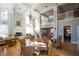 Spacious living room with high ceilings, fireplace, and hardwood floors at 130 River Landing Dr # 6207, Charleston, SC 29492