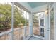 Relaxing screened porch with views of mature trees, providing an enjoyable outdoor living space at 130 River Landing Dr # 6207, Charleston, SC 29492