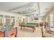 Community game room featuring a pool table and other recreational games at 130 River Landing Drive # 8209, Charleston, SC 29492