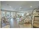 Spacious fitness center with modern equipment and natural light from large windows at 130 River Landing Drive # 8209, Charleston, SC 29492