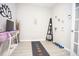 A dedicated home gym with yoga mat, weights, decorative plants, and motivational decor at 130 River Landing Drive # 8209, Charleston, SC 29492