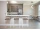 Kitchen with bar stool seating features modern lighting and stainless steel appliances at 130 River Landing Drive # 8209, Charleston, SC 29492