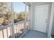 Cozy screened porch with a view of the trees and outdoor scenery, offering a relaxing space with fresh air at 130 River Landing Drive # 8209, Charleston, SC 29492
