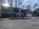 Charming home featuring a well-manicured lawn, dormer windows and a two-car garage at 132 Hidden Fawn Cir, Goose Creek, SC 29445