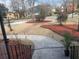 Well-manicured front yard with a stone walkway, mature landscaping and colorful mulch at 132 Hidden Fawn Cir, Goose Creek, SC 29445