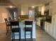 Modern kitchen with granite countertops, stainless steel appliances and eat-in bar at 132 Hidden Fawn Cir, Goose Creek, SC 29445