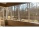 Relaxing screened porch providing an outdoor space with views of the wooded backyard at 132 Hidden Fawn Cir, Goose Creek, SC 29445