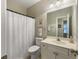 Neutral bathroom featuring a white shower curtain, vanity and toilet for a clean and comfortable feel at 138 Golfview Ln, Summerville, SC 29485