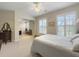 Bright bedroom featuring natural light, neutral walls, and plush carpet at 138 Golfview Ln, Summerville, SC 29485