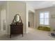 Inviting bedroom with a dark wood dresser and bright natural light at 138 Golfview Ln, Summerville, SC 29485