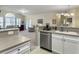 Bright kitchen overlooking the living area, complete with stainless steel appliances and ample counter space at 138 Golfview Ln, Summerville, SC 29485