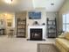 Comfortable living area featuring a fireplace, TV, and open layout for easy socializing at 138 Golfview Ln, Summerville, SC 29485