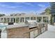 Outdoor stainless grill station adjacent to the clubhouse makes entertaining a breeze at 1505 Basildon Rd, Mount Pleasant, SC 29466