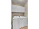 Laundry room featuring white cabinets and a washer and dryer set at 1505 Basildon Rd, Mount Pleasant, SC 29466