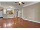 The living room has hardwood floors and is right next to the kitchen at 1505 Basildon Rd, Mount Pleasant, SC 29466