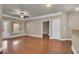 View of the living room featuring wood floors, neutral wall paint and a ceiling fan at 1505 Basildon Rd, Mount Pleasant, SC 29466