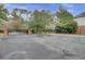 Gated resident parking area surrounded by mature trees and landscaping at 1505 Basildon Rd, Mount Pleasant, SC 29466