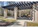 A decorative and shaded pergola in the outdoor community space for relaxation at 1505 Basildon Rd, Mount Pleasant, SC 29466
