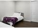 Bright bedroom with hardwood floors, neutral paint, twin bed and a large closet at 1520 Wakendaw Rd, Mount Pleasant, SC 29464