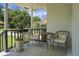 Inviting covered porch with seating provides a relaxing outdoor space at 1520 Wakendaw Rd, Mount Pleasant, SC 29464