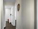 Hallway with light gray walls leading to other rooms, decorated with an octopus wall decoration at 1520 Wakendaw Rd, Mount Pleasant, SC 29464