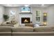 The living room with fireplace provides comfortable seating and an inviting atmosphere at 1520 Wakendaw Rd, Mount Pleasant, SC 29464