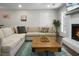 The living room showcases a large sectional sofa and a unique wooden coffee table at 1520 Wakendaw Rd, Mount Pleasant, SC 29464