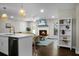 Cozy living room with fireplace, TV, comfortable seating, and stylish decor elements at 1520 Wakendaw Rd, Mount Pleasant, SC 29464