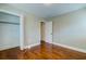 Comfortable bedroom with hardwood floors, closet, and white trim at 1556 Larry St, North Charleston, SC 29405